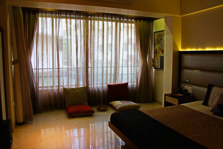 Camera da letto in stile  di Elevate Lifestyles