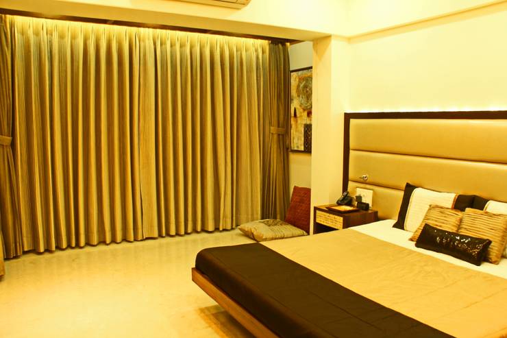 Camera da letto in stile  di Elevate Lifestyles