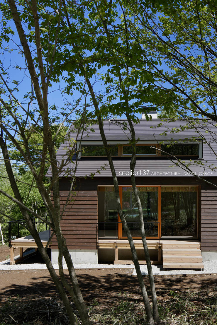 Casas de estilo  por atelier137 ARCHITECTURAL DESIGN OFFICE