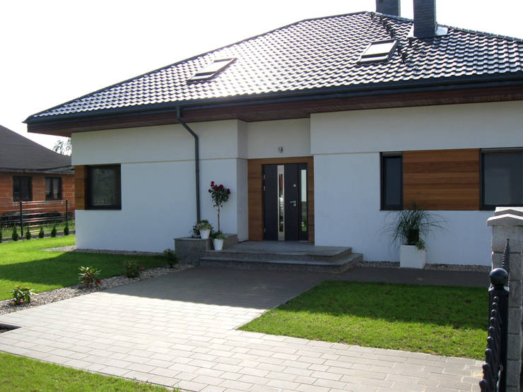 Case in stile  di Pracownia Projektowa ARCHIPELAG