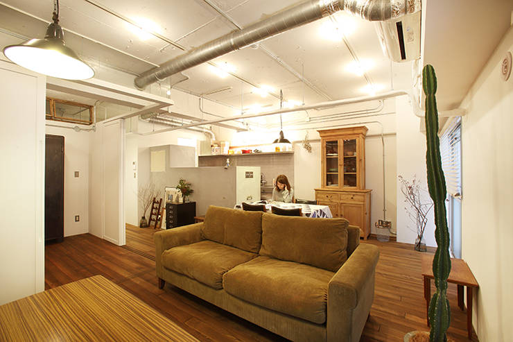 Livings de estilo  por SWITCH&Co.