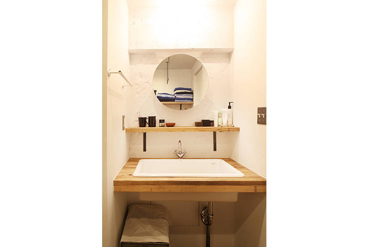 Baños de estilo  por SWITCH&Co.