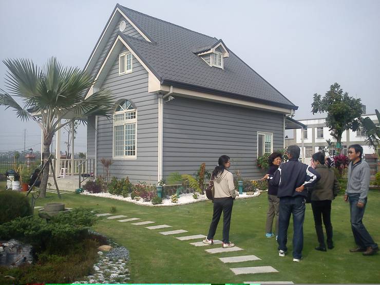 Maisons de style  par 晶莊工程有限公司