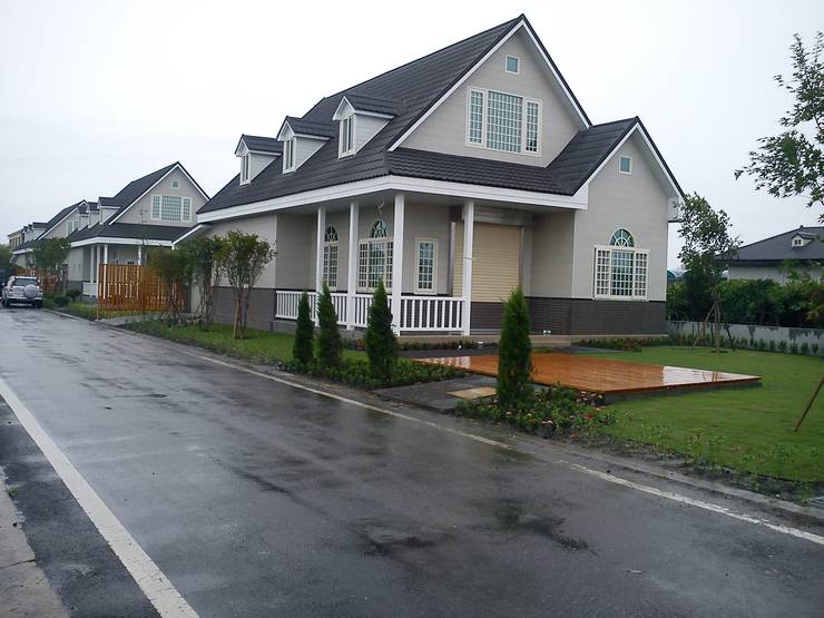 Maisons de style  par 晶莊工程有限公司