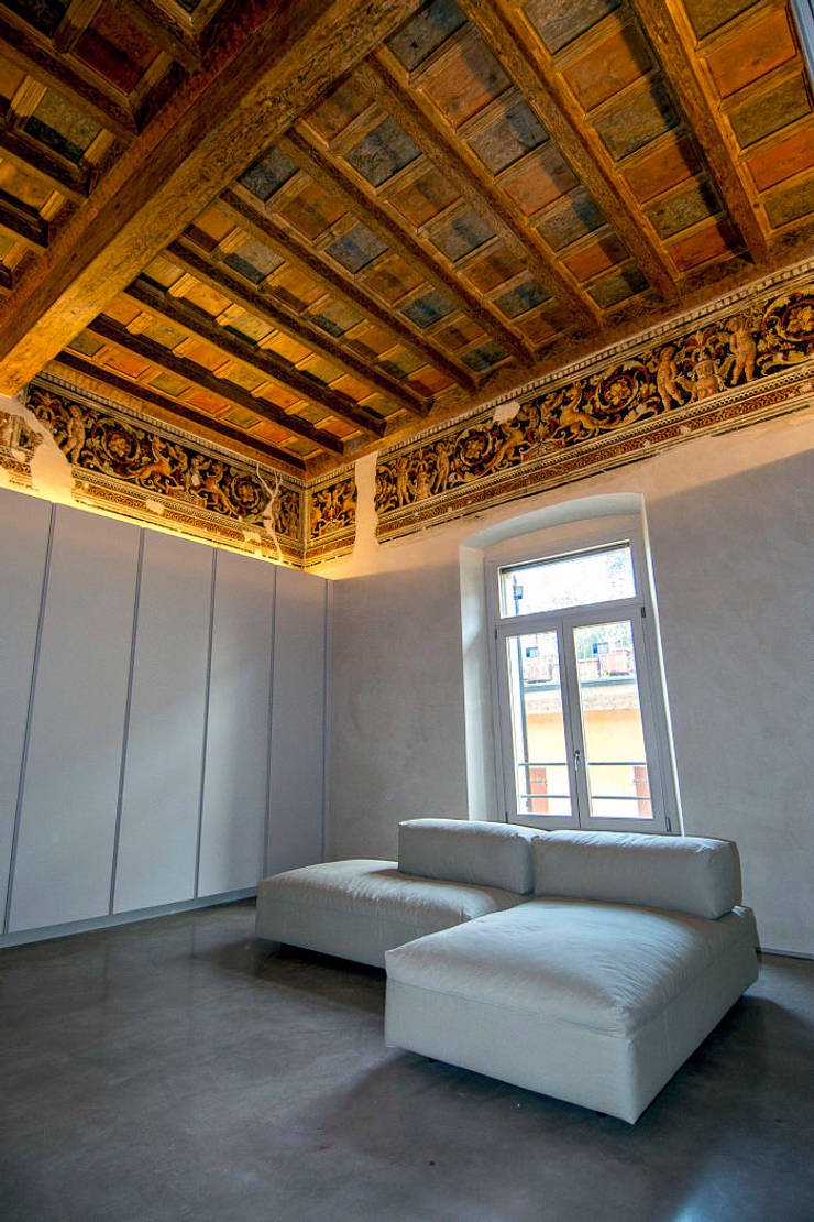  غرفة المعيشة تنفيذ studio di architettura DISEGNO