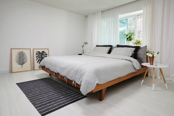 Camera da letto in stile  di 노르딕앤