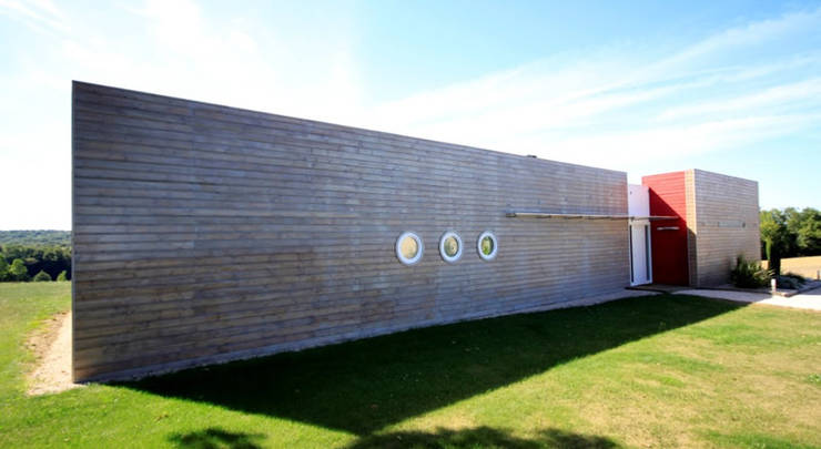 Casas de madera de estilo  por Rusticasa