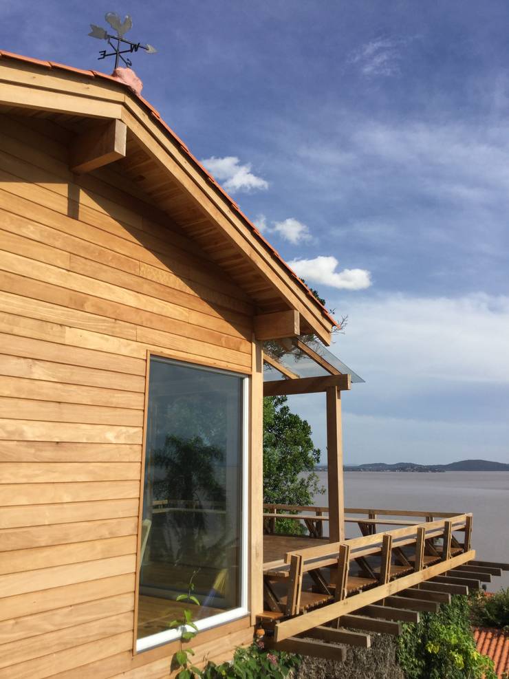 Casas de estilo  por CABRAL Arquitetos