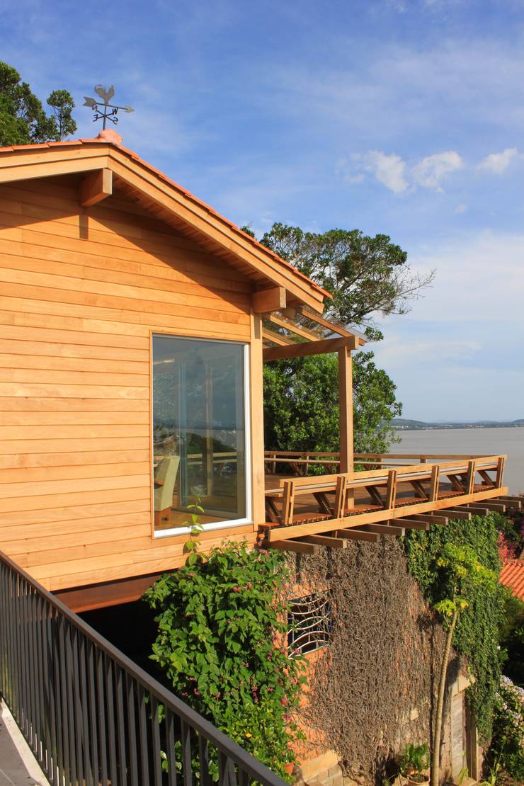 Casas de estilo  por CABRAL Arquitetos