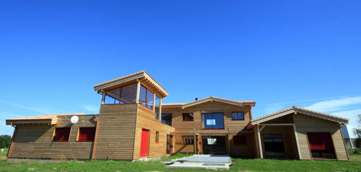 Casas de madera de estilo  por Rusticasa