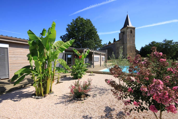 Casas de madera de estilo  por Rusticasa