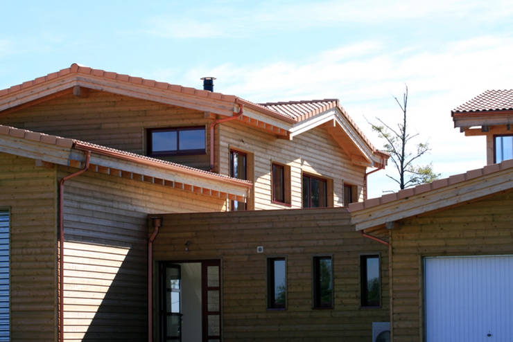 Casas de madera de estilo  por Rusticasa