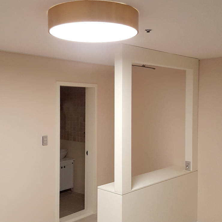 Sala multimediale in stile  di 마당디자인 / MADANGDESIGN