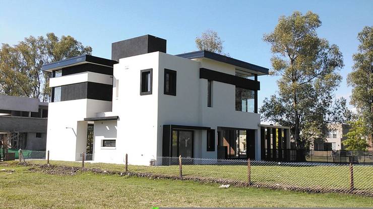 Casas de estilo  por Grupo PZ