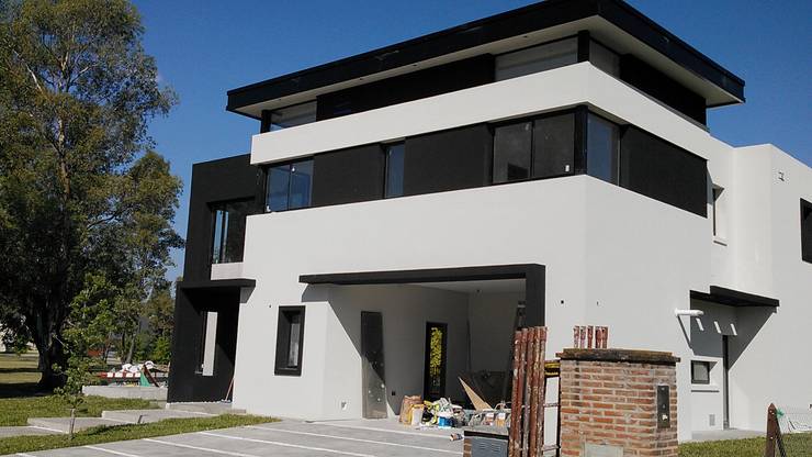 Casas de estilo  por Grupo PZ