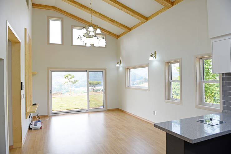 Salas / recibidores de estilo  por 한다움건설