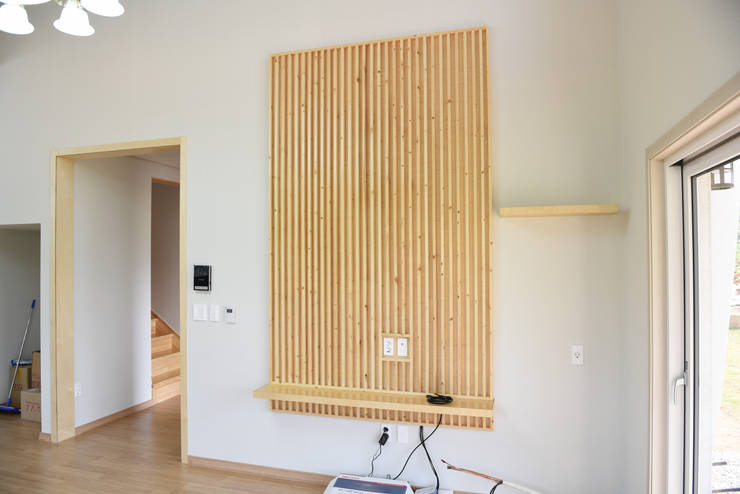 Salas / recibidores de estilo  por 한다움건설