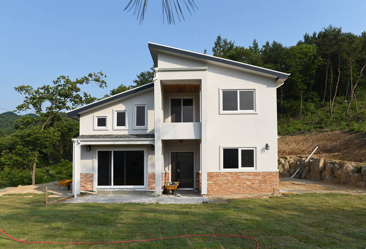 Casas de estilo  por 한다움건설