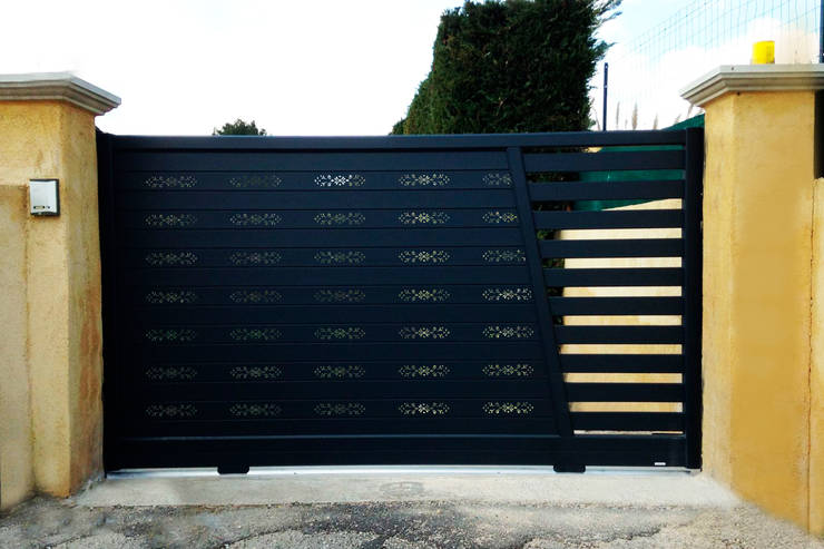 Garajes y galpones de estilo  por Lamitec SA de CV