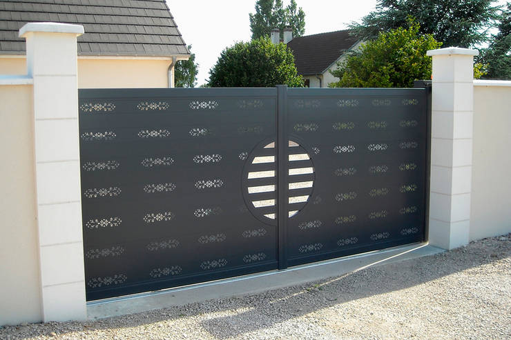 Garajes y galpones de estilo  por Lamitec SA de CV