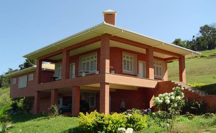 Residência - Mateus Leme MG, SERARTE ENGENHARIA SERARTE ENGENHARIA Casas de campo