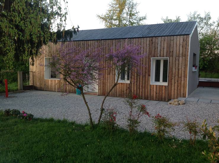 : Casa di legno in stile  di Softarchitecture