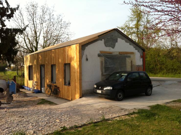 : Casa di legno in stile  di Softarchitecture