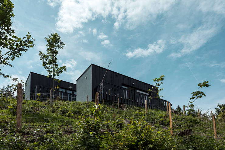 Chalet in stile  di COMMOD-Haus GmbH 