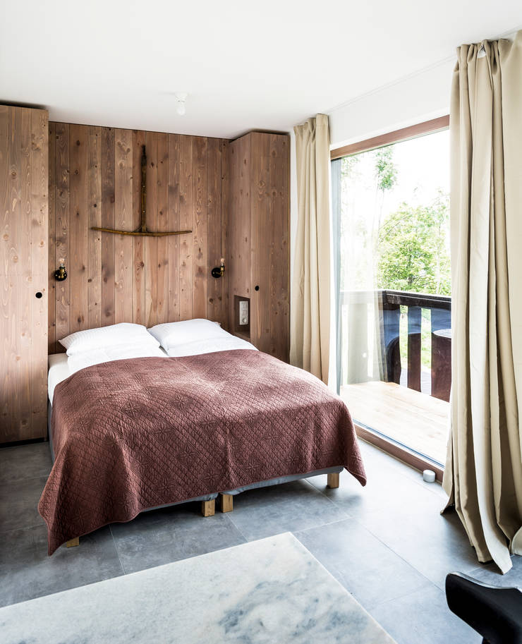 Camera da letto in stile  di COMMOD-Haus GmbH 