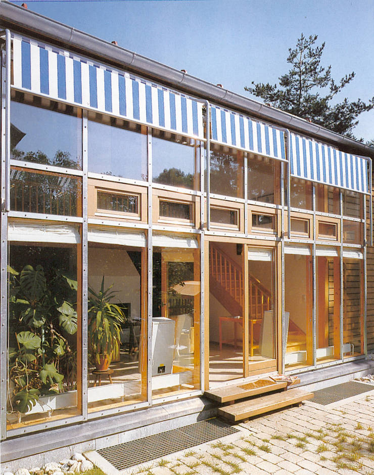 Casa di legno in stile  di Architekturbüro Michael Bidner