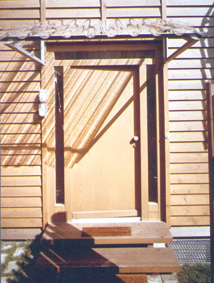 Casa di legno in stile  di Architekturbüro Michael Bidner