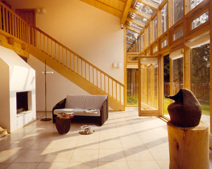 Casa di legno in stile  di Architekturbüro Michael Bidner