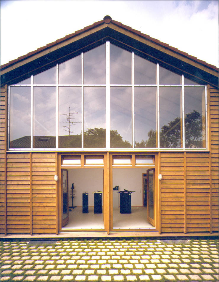 Casa di legno in stile  di Architekturbüro Michael Bidner