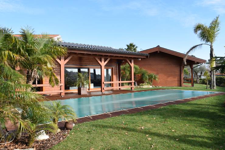 Chalés e casas de madeira  por Rusticasa