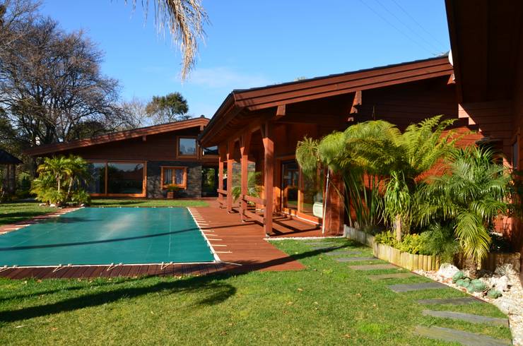 Chalés e casas de madeira  por Rusticasa