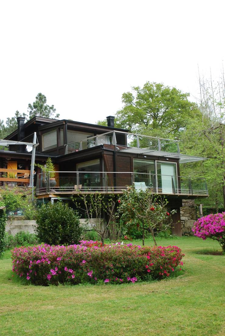 Casa di legno in stile  di Rusticasa