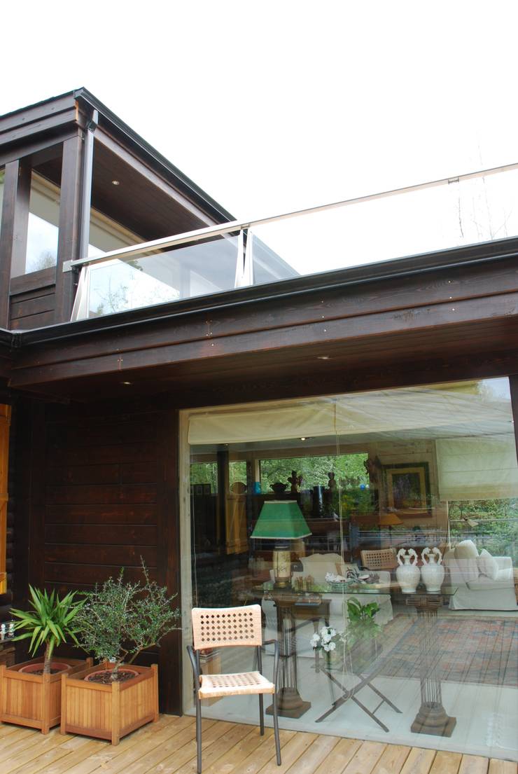 Casa di legno in stile  di Rusticasa