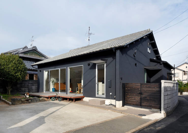 Casas de estilo  por atelier m