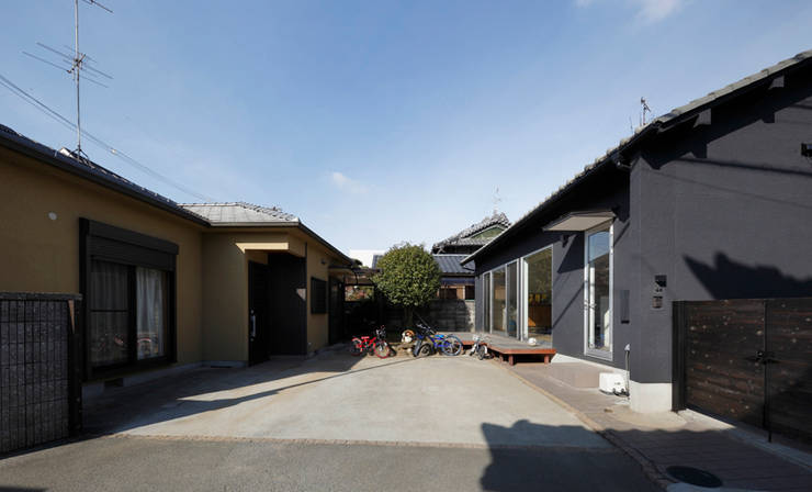 Casas de estilo  por atelier m