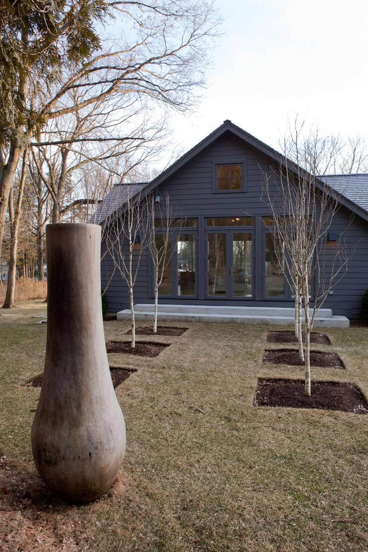 Casas de campo de estilo  por andretchelistcheffarchitects