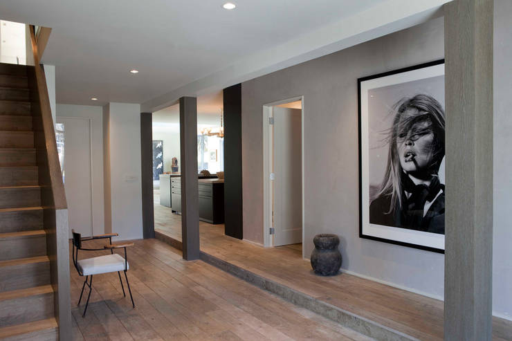 Pasillos y vestíbulos de estilo  por andretchelistcheffarchitects
