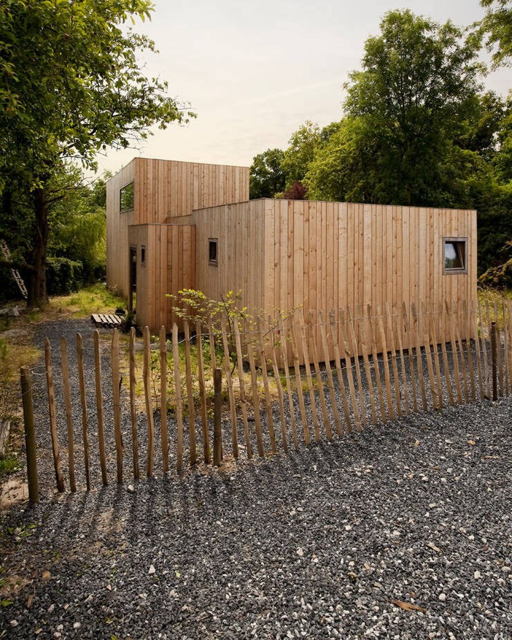 Casa di legno in stile  di m architecture