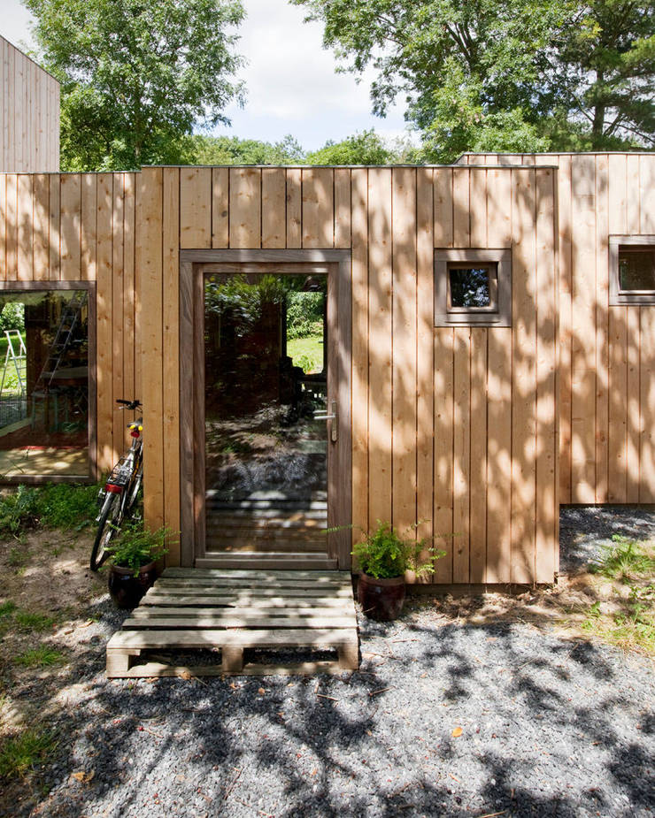 Casa di legno in stile  di m architecture