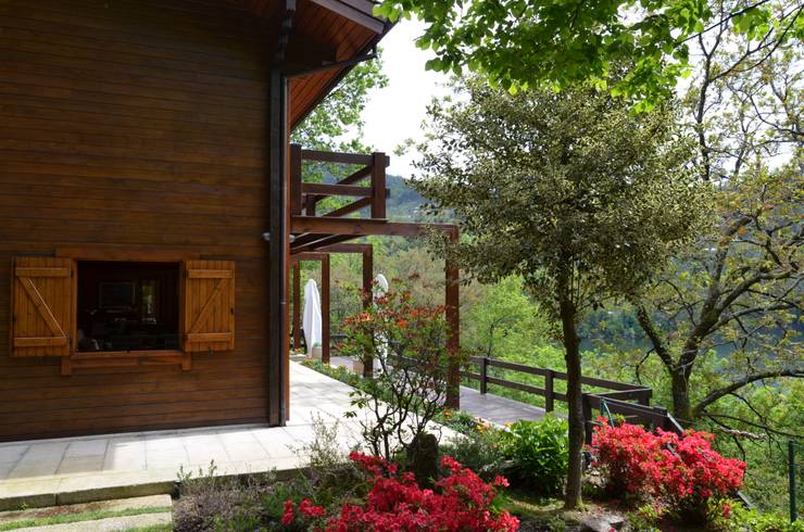 Casa di legno in stile  di Rusticasa