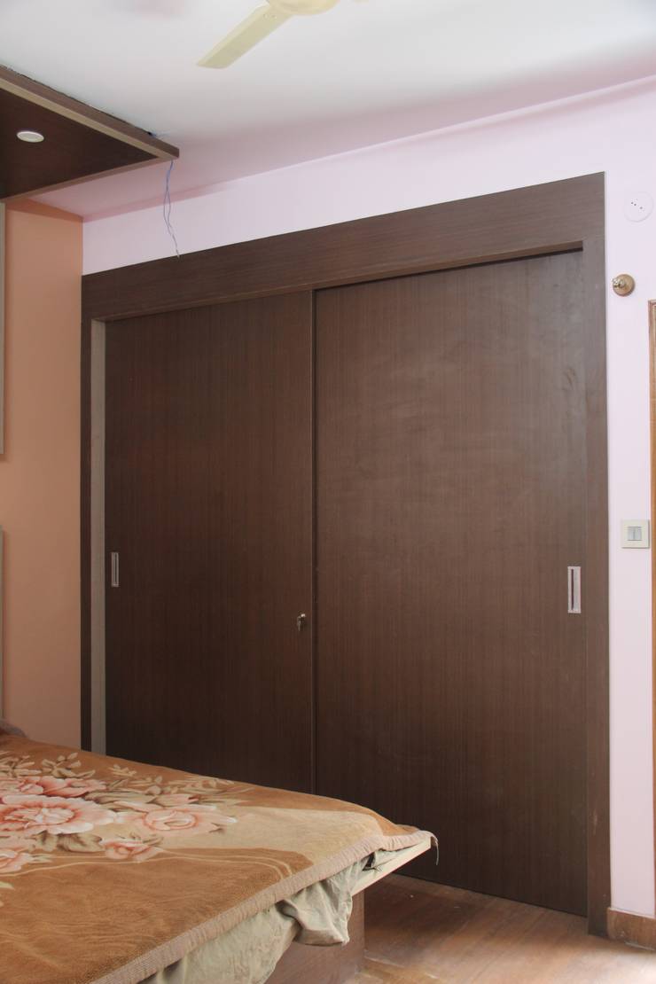 Recámaras de estilo  por Pebblewood.in