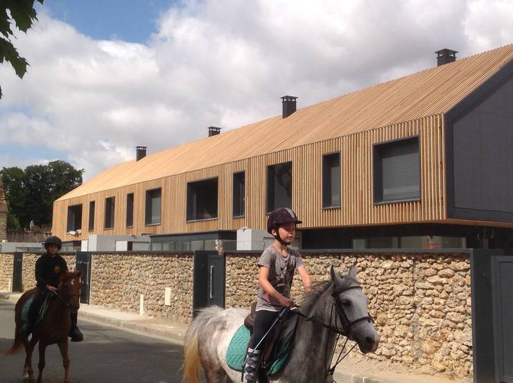 Casas multifamiliares de estilo  por EC-BOIS