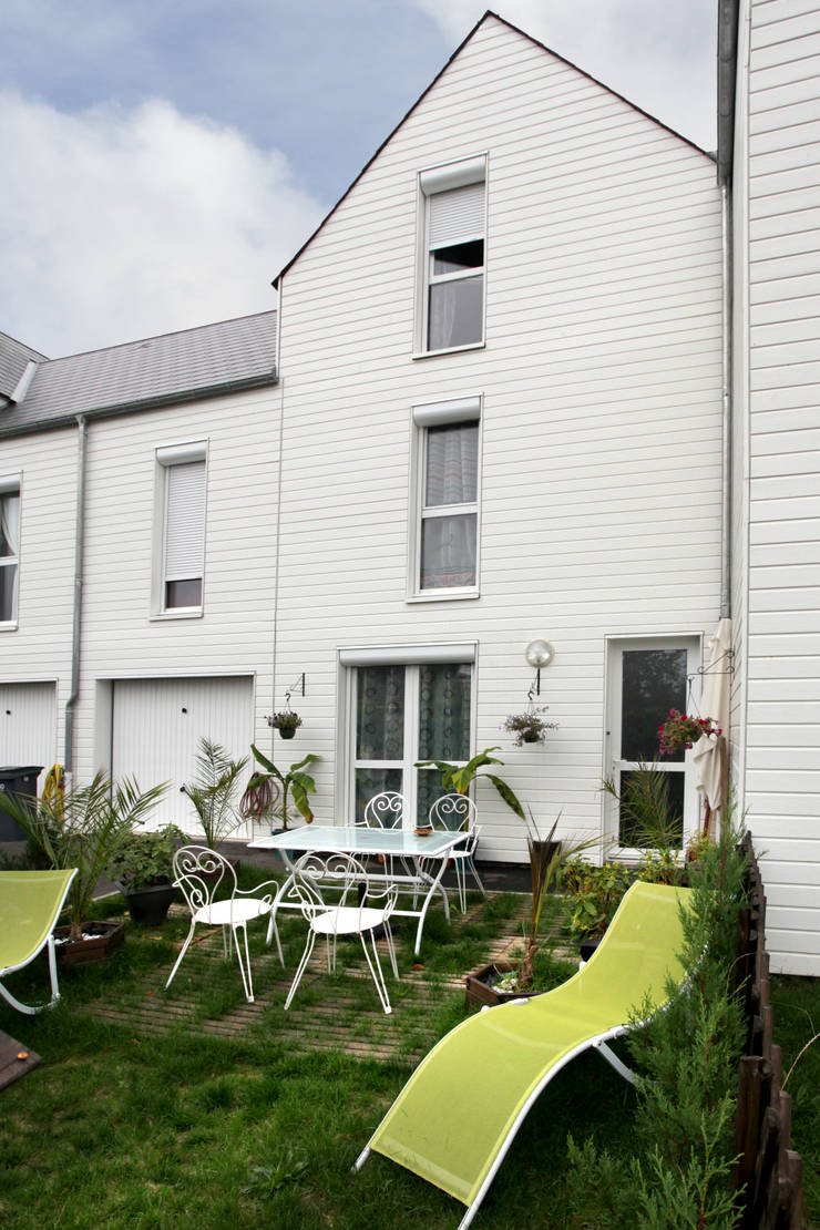 Casas multifamiliares de estilo  por EC-BOIS