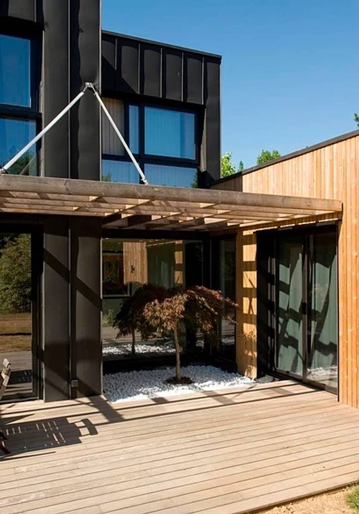  Wooden houses by EC-BOIS