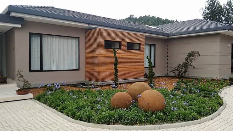 Projekty,  Dom rustykalny zaprojektowane przez Espacios Positivos