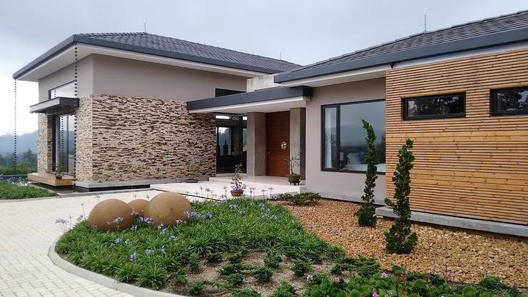 Projekty,  Dom rustykalny zaprojektowane przez Espacios Positivos